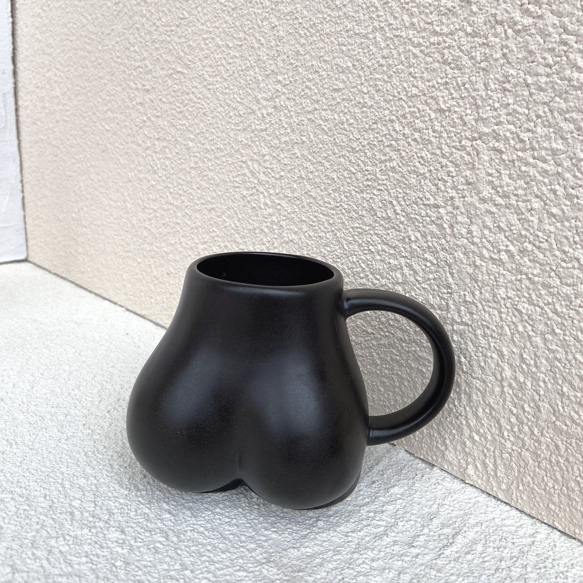 butt mug white black beige