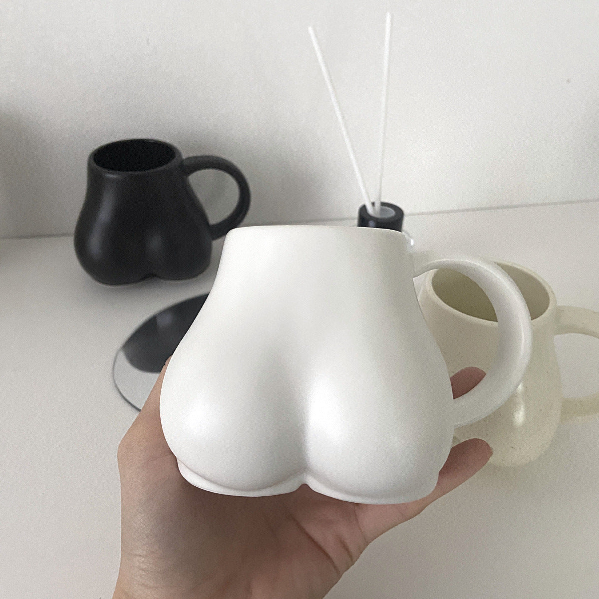 butt mug white black beige